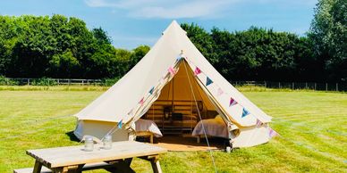 Luxury 5m bell tent with picnic table in 5 acres of grass meadow