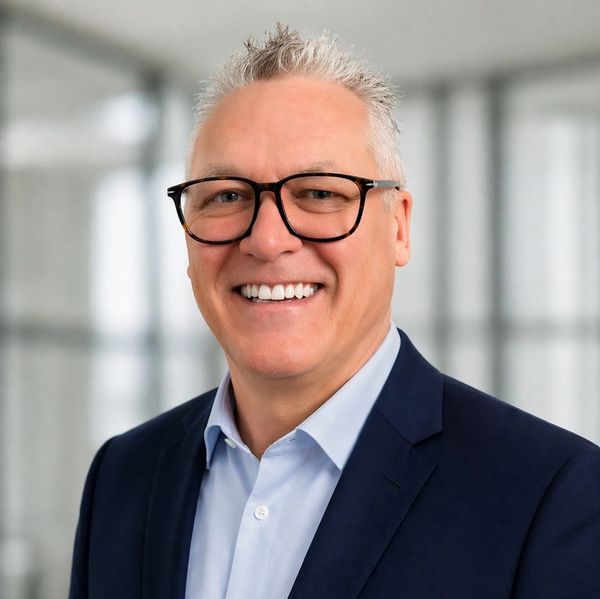 Professional headshot of Alistair Dearie, founder of LAM Development Solutions.