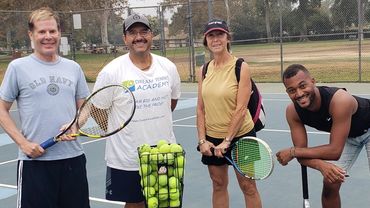 Coach David with students (John, Maria, and Sheldon) in NOHO tennis courts after lesson and games.