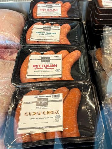 Packaged chicken sausages labeled Hot Italian, Sweet Italian, and Chicken Chorizo.