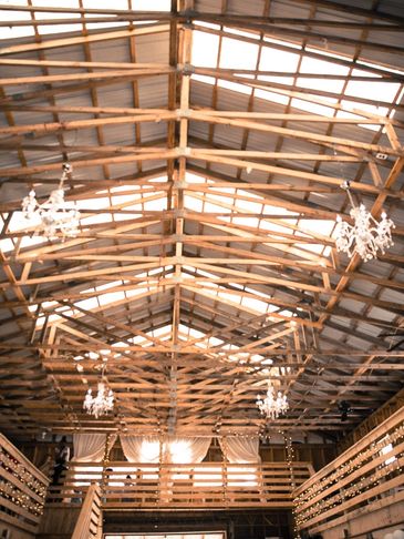 A view of our curtains inside our barn wedding venue.