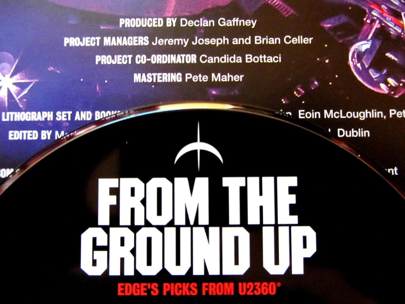 CD titled 'From The Ground Up' with credits in the background.