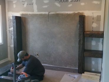 Bellhaven custom stone and reclaimed wood design feature