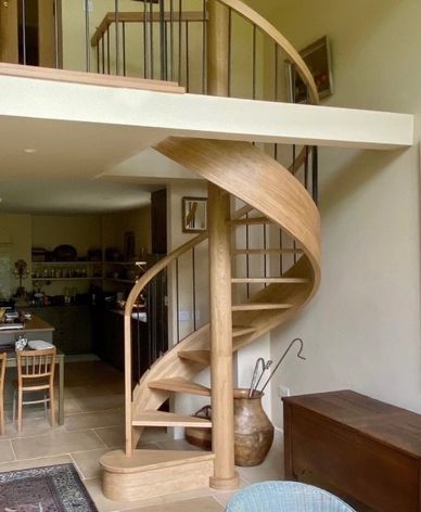 Oak Spiral staircase with antique bronze spindles for Christopher & Ann Dixon's beautiful house in t