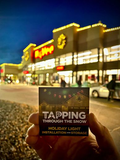 Completed commercial holiday lights display by TAP Roofing and Siding LLC