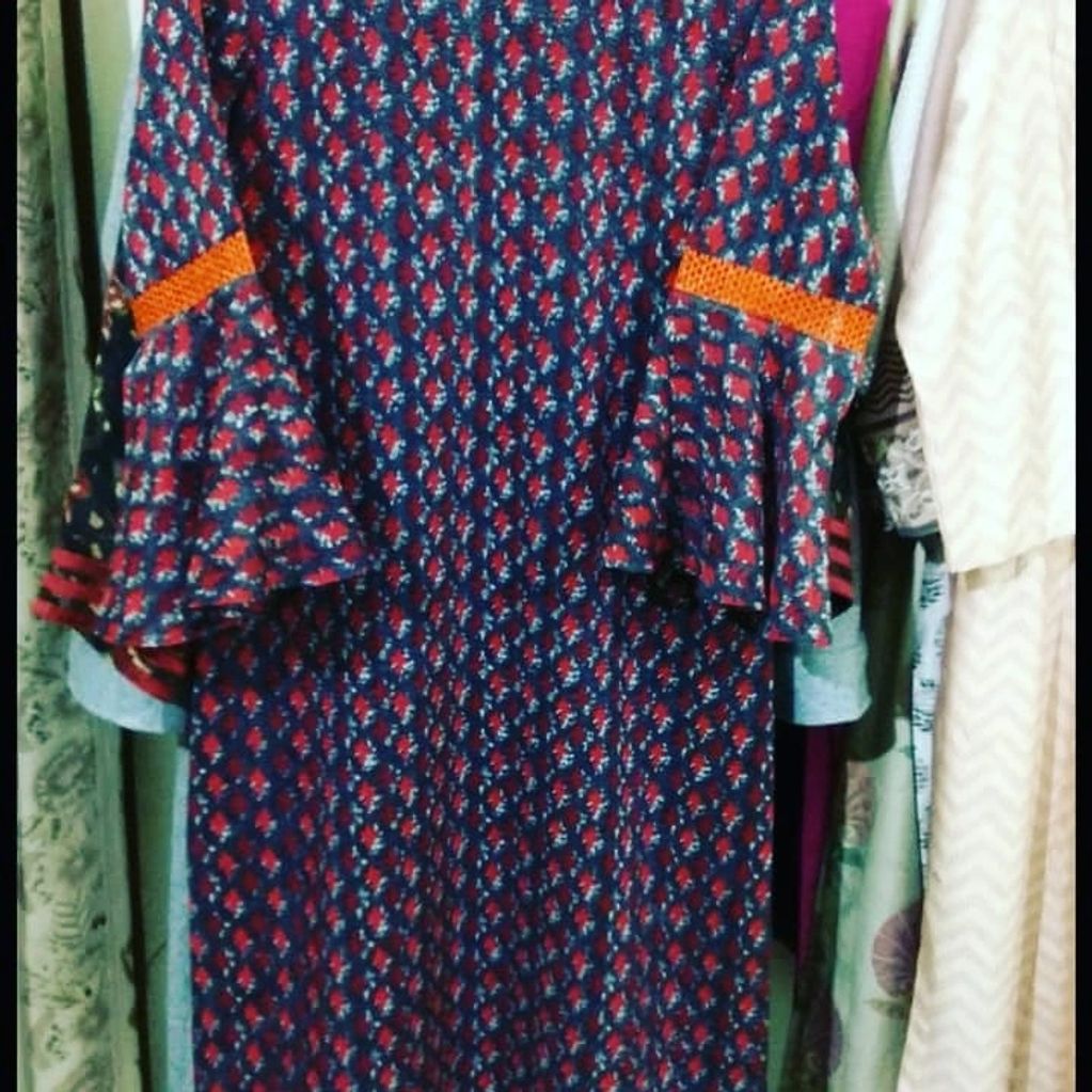 MADE TO MEASURE PRINTED KURTA DESIGNED WITH BOTTOM BELL SLEEVES.