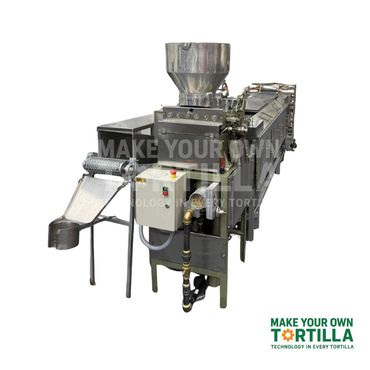 Commercial tortilla-making machine with stainless steel components and conveyor belt.