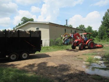 Kubota Tractor Removing Debris