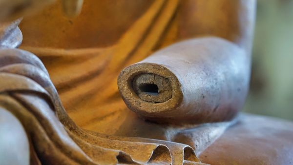 zoom on arm of the etruscan sarcophagus of the spouses in the Louvre