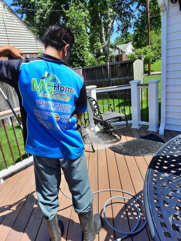Pressure washing decks and siding