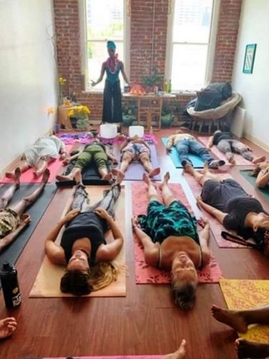 Keema grounding group with guided meditation in preparation for sound healing in Chinatown on Oahu