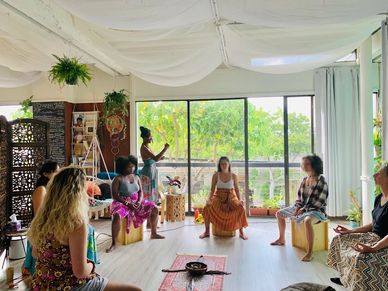 Keema Cooper Giesselmann doing sound healing for women receiving pelvic steaming in Kailua Hawaii