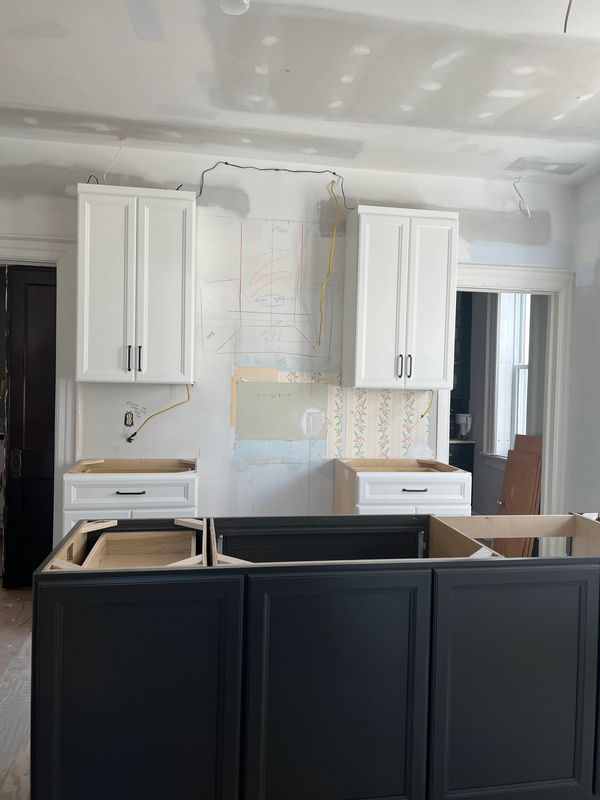 Cabinets in and need to to fill in the space where ceilings came out.