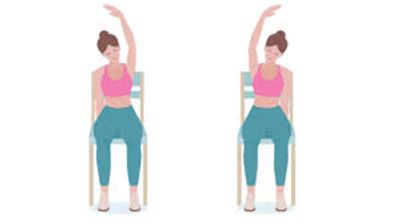 Woman doing seated side stretches on a chair.