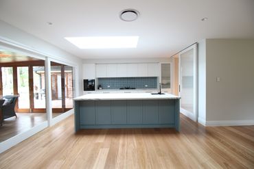 Modern white and grey kitchen renovation