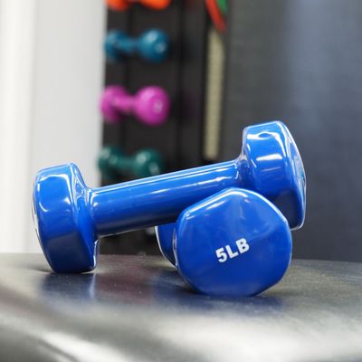 Closeup of 5lb dumbbells on bench taken by Ruth Wentzell, Physiotherapist