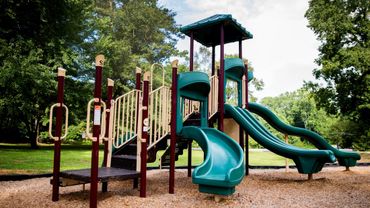 Installation of a commercial playground at a park district.