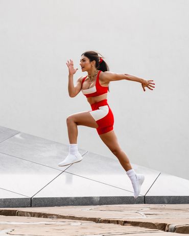 sporty fitness girl jumps like an athlete