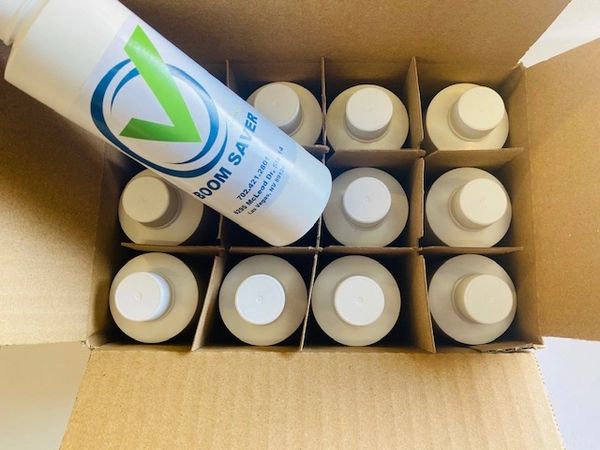Bottles Boom Saver Liquid. Concrete Retardant.
