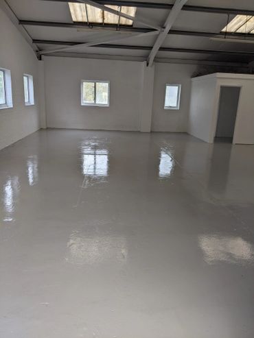 painting a business unit and epoxy floor 