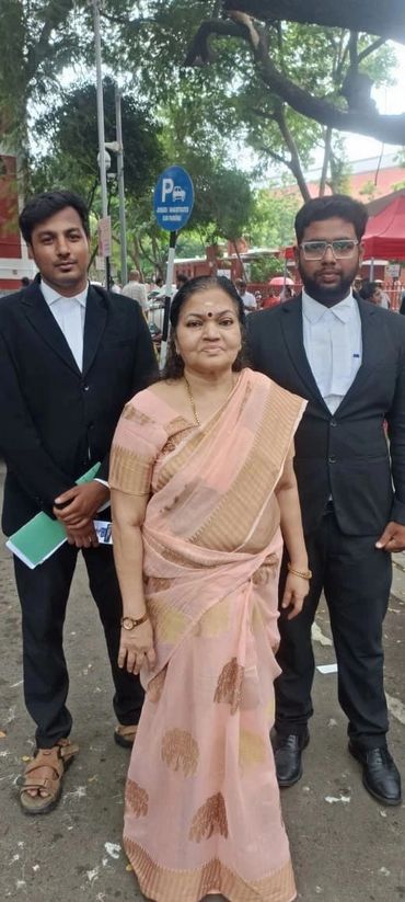 Advocate team outside a court complex in Chennai, representing professional legal practice and court
