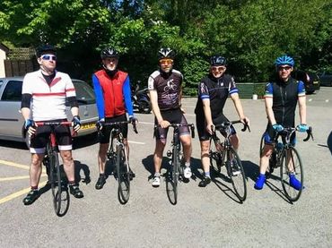 A photo of Sam on a charity bike ride.