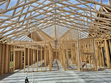 Wood wall framing and roof trusses on a new custom home