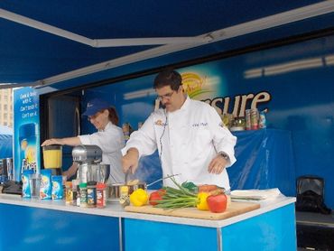 Chefs Stormy & Marti Mongiello working on & off stage for P&G with up to one million guests daily.