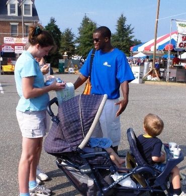 Chefs Stormy & Marti Mongiello working on & off stage for P&G with up to one million guests daily.