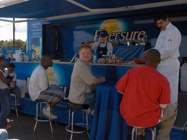 Chefs Stormy & Marti Mongiello working on & off stage for P&G with up to one million guests daily.