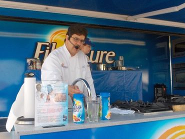 Chefs Stormy & Marti Mongiello working on & off stage for P&G with up to one million guests daily.