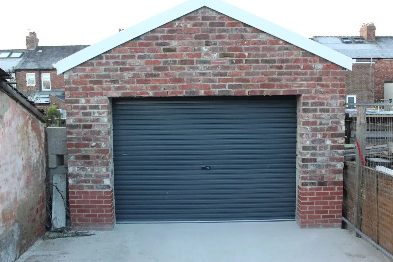 newly installed garage with grey garage door