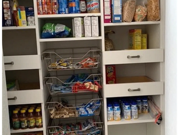 Organized pantry with snacks and drinks.