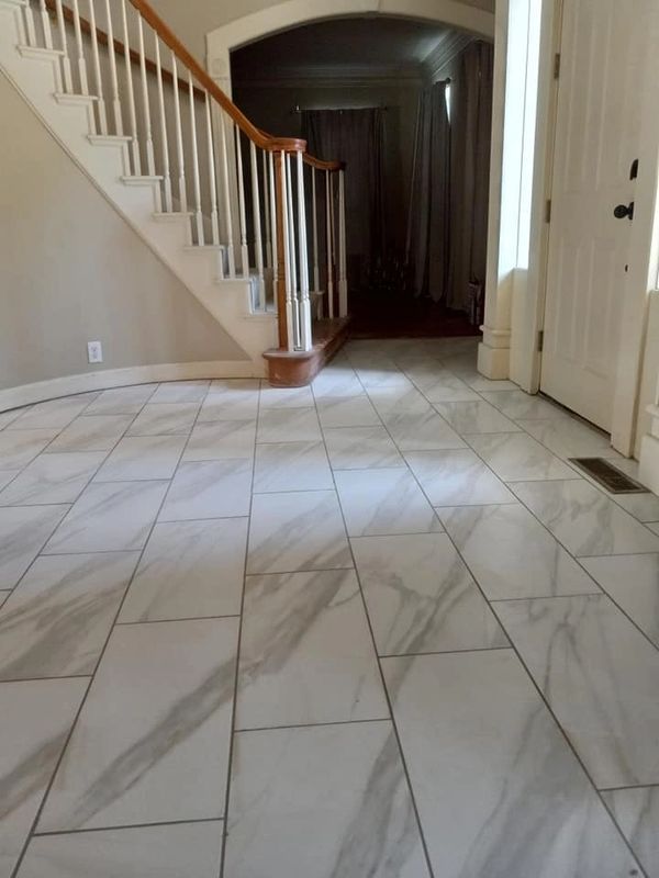 marble-look tile flooring in entryway