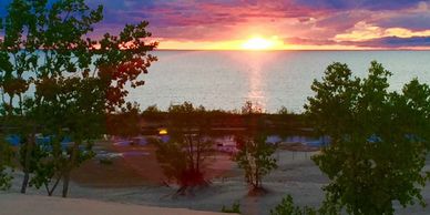 Experience the best sunset in West Michigan at Silver Lake at the Sand Dunes.