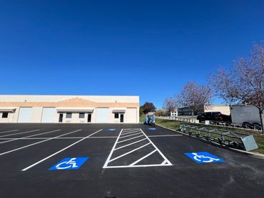 Overlay asphalt paving and striping in Midvale, UT.