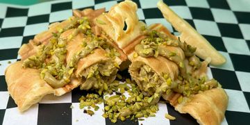 Pistachio Crepe on a stick - Golden batter filled with homemade Pistachio paste