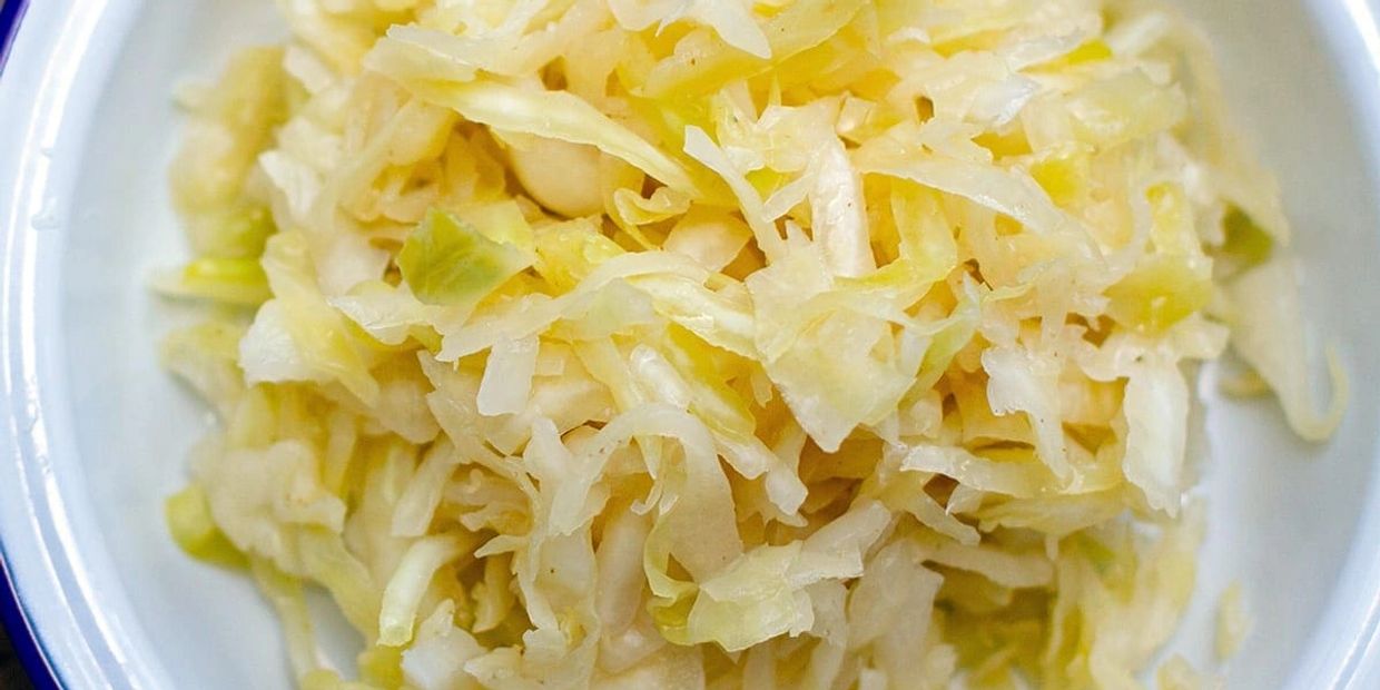 Close-up of shredded cabbage in a bowl.