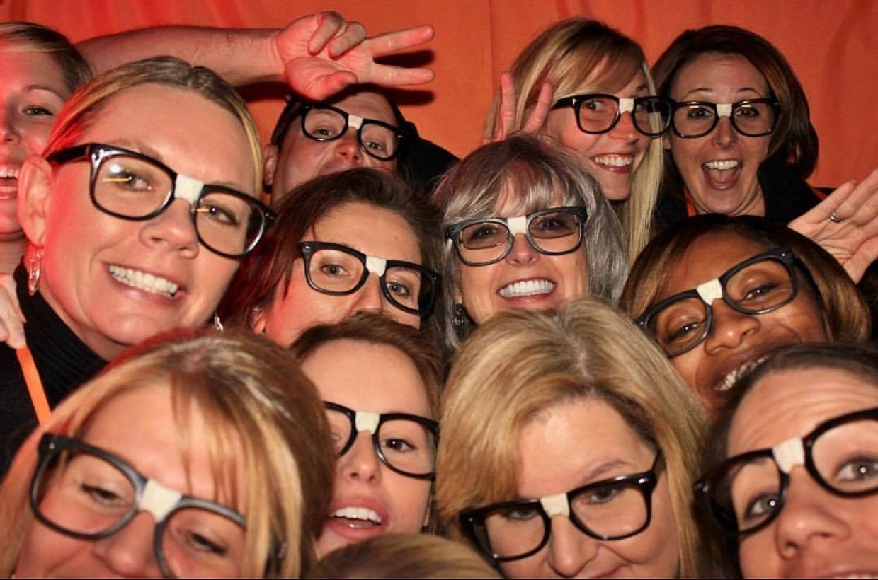 Dr. Tom’s dental staff having fun at a ProsOnly Entertainment photo booth in Greenville, SC.