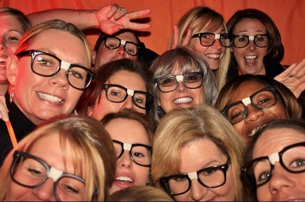 Dr. Tom’s dental staff having fun at a ProsOnly Entertainment photo booth in Greenville, SC.
