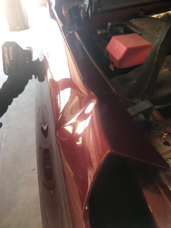 Big crease dent on on right fender