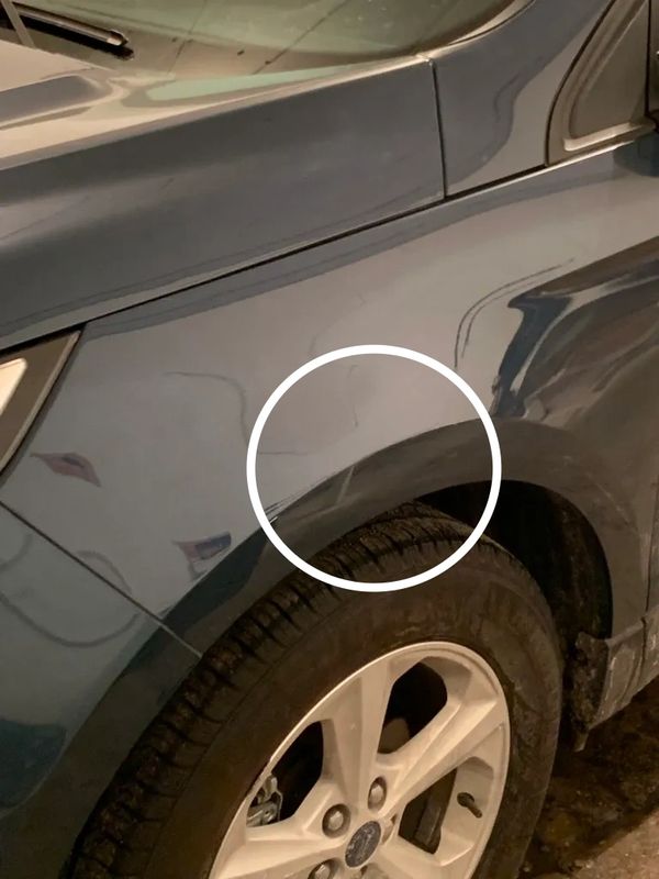 Big dent on a body line of a fender gone