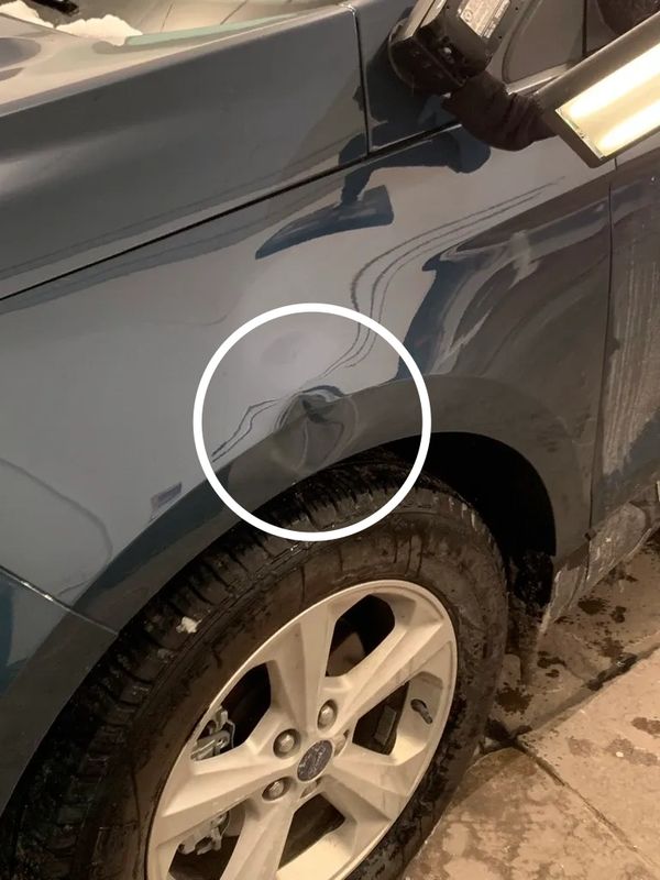 Big dent on body line of a fender