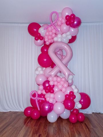 Breast cancer awareness ribbon. breast cancer awareness balloons. pink ribbon balloon decor. tower