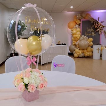 hot air balloon flower arrangement. flower arrangement centerpieces. personalized decorations