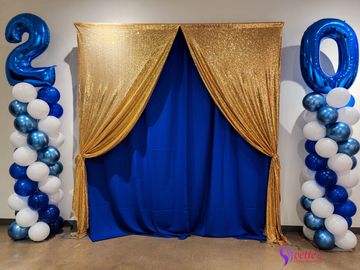Double layered drapery backdrop for pictures. backdrop rental for photo booth. Rpyal blue and gold