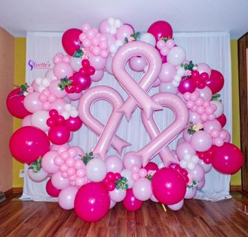 hoop round balloon arch. breast cancer awareness balloons. pink October balloon decor. party rentals