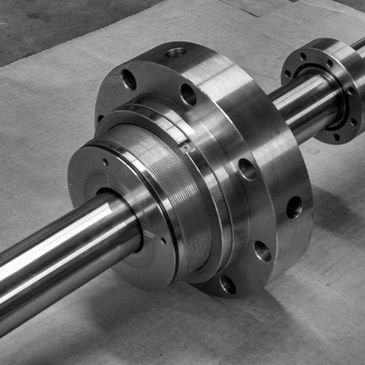A custom precision machined shaft made in our Nacogdoches, TX production facility