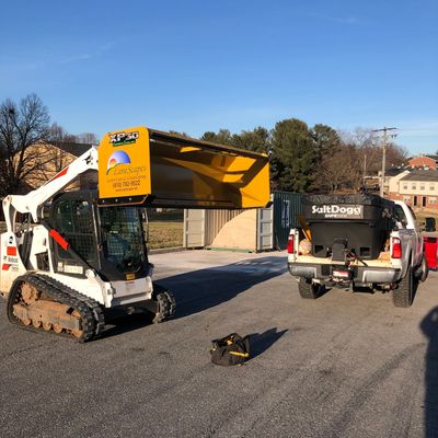 Snow plow with skid loader and push box | LaneScapes Lawn Care