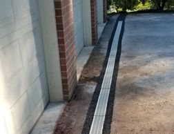 Channel drain. Landscape Drainage in Westminster Md Carroll County Maryland. French Drain, Gutters